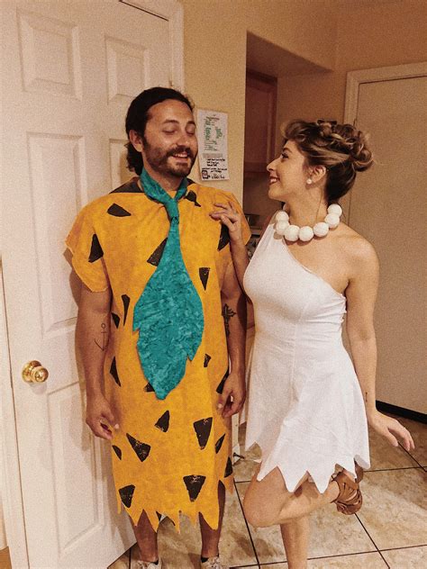The first time was just string and some Styrofoam balls. . Fred and wilma costume